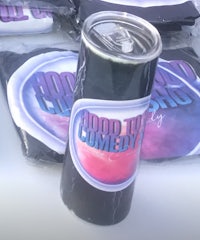 a can with a logo on it sitting on a table